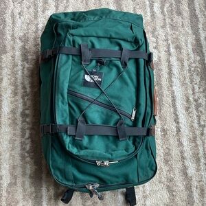 North Face heavy duty duffel with zip off day pack, excellent condition.
